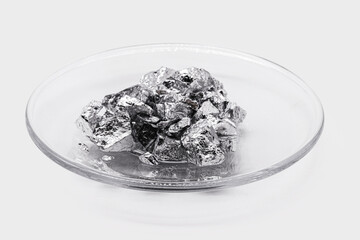 plate with chromium ore, industrial use ore, metallic chemical element, isolated on white background