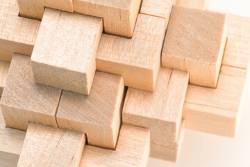 Wooden block puzzle isolated on white background.