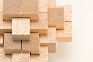 Wooden block puzzle isolated on white background. - obrazy, fototapety, plakaty