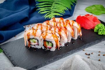 Sushi rolls with shrimp, cream cheese, unagi and tiger prawns. Traditional Japanese cuisine