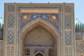 SAMARKAND, UZBEKISTAN - JUNE 09, 2022: Sher Dor Madrasa (Ulugh Bek) is a part of Registan ancient city.