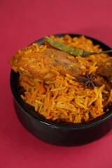 Dum Handi chicken Biryani is prepared in an earthen or clay pot called Haandi. Popular Indian non vegetarian food, Biryani with chicken. Traditional Indian dish of rice and chicken marinated in spices