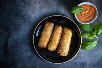 Nem food meat vegetable nems spicy sauce cuisine deep fried spring rolls fresh meal food snack  on the table copy space food background rustic - obrazy, fototapety, plakaty