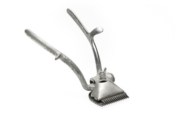 Vintage old hair clipper isolated on a white background