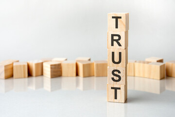 trust concept. wooden blocks with text on grey table. copy space