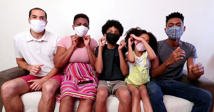 Mixed Race Family Wearing Covid-19 Face Mask Indoors