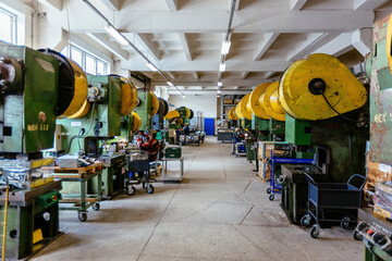 Metal press form stamping machines in workshop