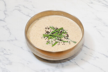 Korean Perilla Seed Sujebi on bright background.