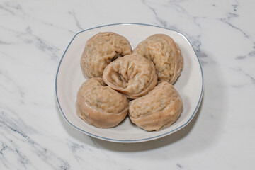 Buckwheat Dumpling on bright background.