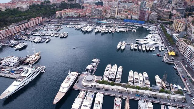 Aerial View of Monte Carlo Port, Monaco, Luxury Yachts and Sailboats Marina, Drone Shot