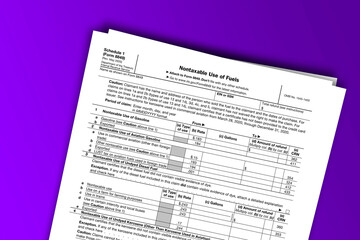 Form 8849 (Schedule 1) documentation published IRS USA 43836. American tax document on colored