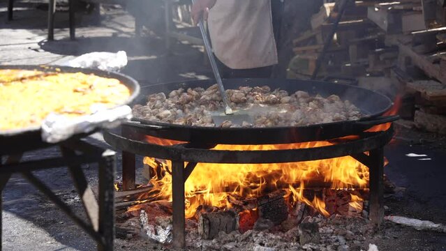 Chicken Cooking On Open Fire At Playa De Burriana Beach, Nerja, Costa Del Sol, Malaga Province