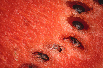 watermelon full frame macro on fresh ripe juicy slice background