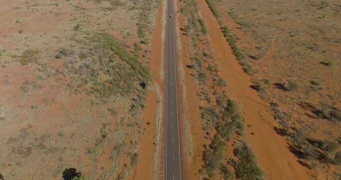 Camper van driving through the out back in Australia.