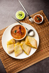 Cut Masala dosa or spring dosa is a South Indian meal served with sambhar and coconut chutney.