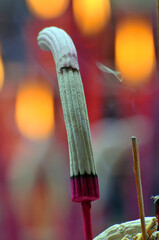Burning incense in Chinese temple 