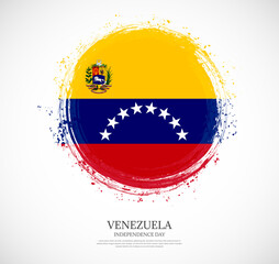 Creative circular grungy shape brush stroke flag of Venezuela on a solid background