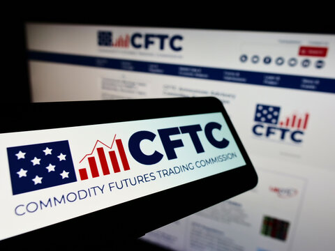 Stuttgart, Germany - 07-13-2022: Smartphone with logo of American Commodity Futures Trading Commission (CFTC) on screen in front of website. Focus on center of phone display.