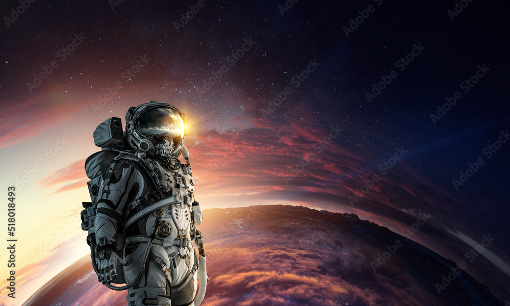 Canvas Prints astronaut walking on an unexplored planet