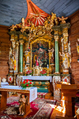 Fototapeta premium The interior of the wooden church Blessed Virgin Mary of the Assumption from 1743 in Czarlejno, Greater Poland voivodeship, Poland.