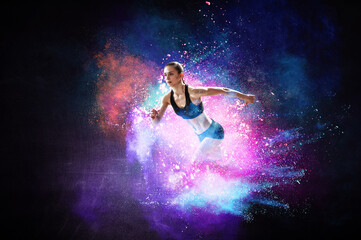 Fototapeta na wymiar Athletic woman runner on colourful background