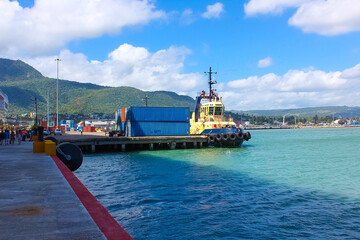 Ships, boats, containers, Puerto Plata harbor, port and cityscape of the industrial zone, Dominican...