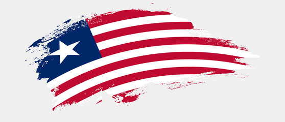National flag of Liberia with curve stain brush stroke effect on white background