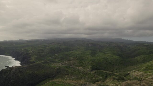 We drift into the island of Maui, Hawaii greeted by a lush green microclimate of tropical rainforest plants.   A haze of rain will greet us soon.