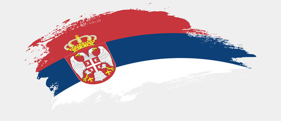National flag of Serbia with curve stain brush stroke effect on white background