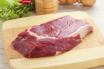 Raw rib-eye beef steak black angus