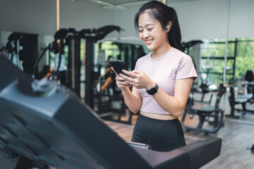 Fototapeta na wymiar Portrait asian woman exercising workout and training in gym for healthy