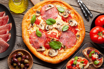 Italian cuisine. Pizza and toasts
