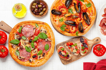 Italian cuisine. Pizza and toasts