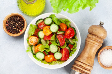 Fresh salad with tomato and cucumber