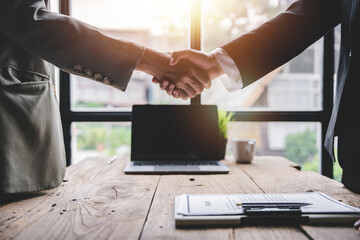 business partner handshake concept Colleagues shaking hands Successful deal after a great meeting....