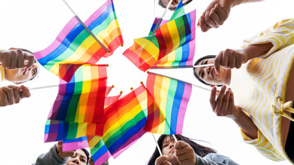 LGBTQ Rainbow Flags being waved symbol of Diversity Gay and lesbian for Celebration gay pride parade, Concept of     homosexual, gay community LGBTQ society, Lesbians and gays representatives of LGBTQ