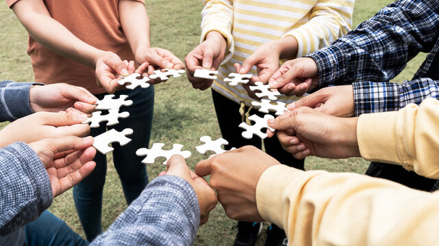 Team Hands Empathy Trust Partner partnership grow and placing the jigsaw puzzle for connect business partner and connection integration start up concept Empathy teamwork. Team Volunter charity Faith.