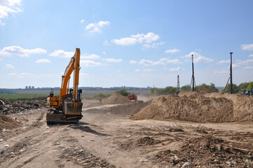 Excavation work on the polluted area of city landfill
