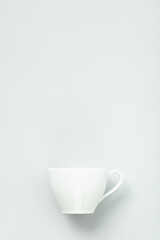 Fototapeta na wymiar White cup on grey background, flat lay, mock up