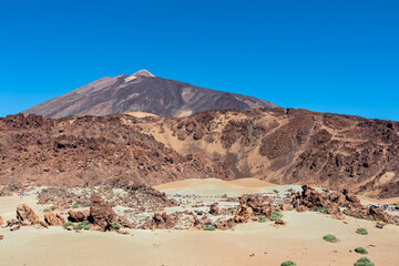 Scenic view on moon landscape of Minas de San Jose Sur near volcano Pico del Teide, Mount El Teide National Park, Tenerife, Canary Islands, Spain, Europe. Lava rocks and pumice field on desert terrain