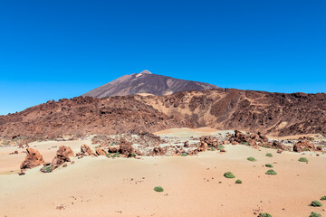 Scenic view on moon landscape of Minas de San Jose Sur near volcano Pico del Teide, Mount El Teide National Park, Tenerife, Canary Islands, Spain, Europe. Lava rocks and pumice field on desert terrain