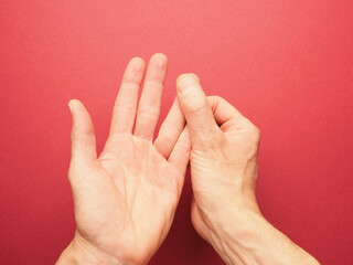 Hand position for mudra no. 3 in Jin Shin Jyutsu, alternative healing method or self-help concept,...