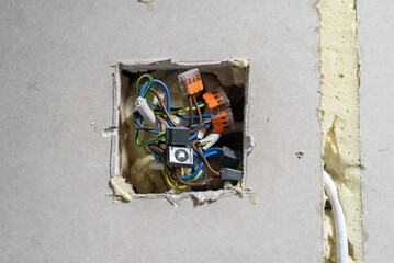 Uninstalled power socket place in drywall, renovation or construction