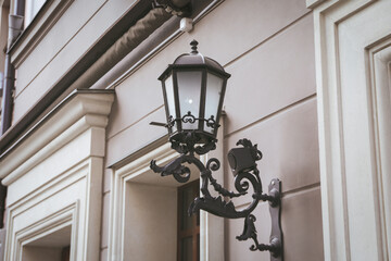 Fototapeta na wymiar Lamp post on house in beautiful old city