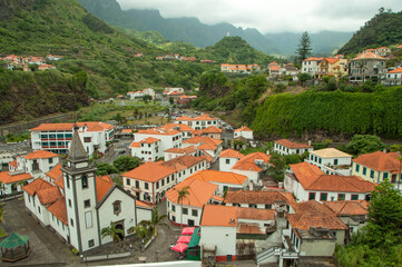 Sao Vincente old city in Madeira island, Portugal. Panorama of city and mountains in background