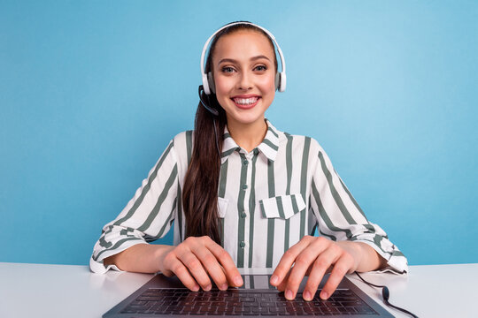 Friendly Female Helpline Operator Sit Desk Use Lnetbook Video Call Clients Isolated On Blue Color Background