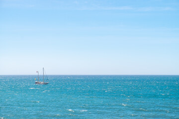Fototapeta premium A sailboat sailing the Mediterranean Sea.