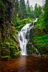 A beautiful Kamienczyka waterfall in the Karkonosze Mountains, Poland