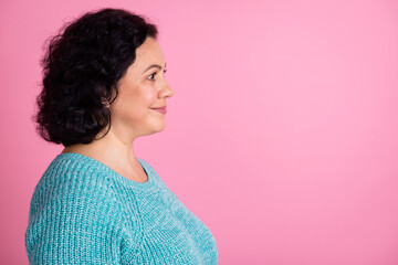 Profile side view portrait of nice looking attractive calm peaceful middle aged lady isolated over...