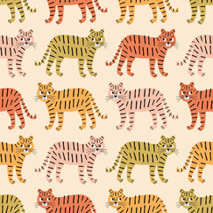 Fototapeta na wymiar Cute colorful tigers hand drawn vector illustration. Funny cat animal seamless pattern for kids fabric or wallpaper.